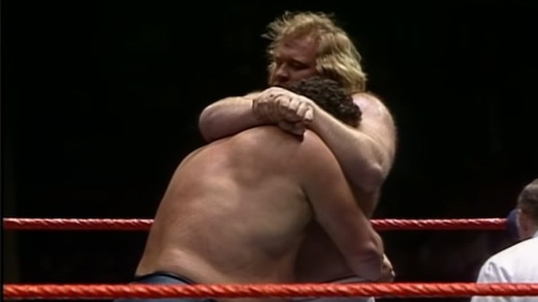 Andre The Giant grabs Big John Studd