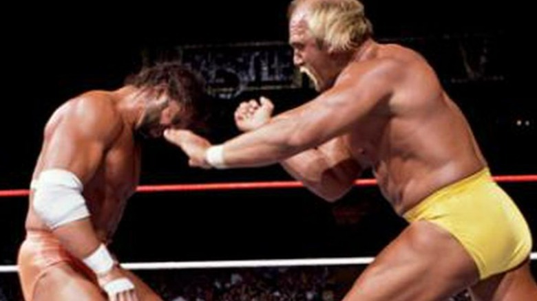 Hulk Hogan punching Randy Savage