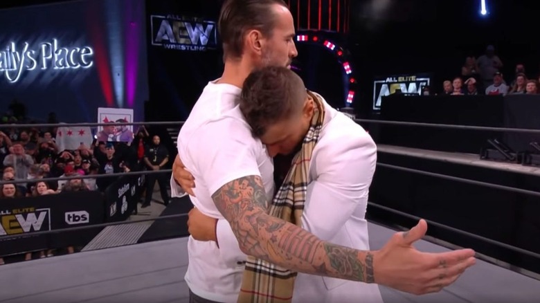 CM Punk and MJF sharing a hug