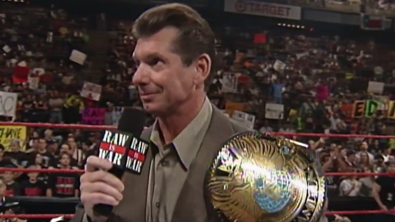 Vince McMahon holding the WWF Championship