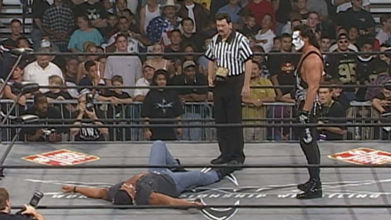 Sting stands over Hogan