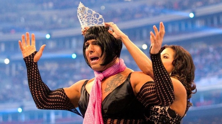 Candice Michelle crowns Santino Marella in his "Santina" gimmick after he won the Miss WrestleMania battle royal at the 25th anniversary of the event.