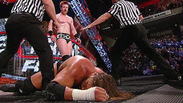 Sheamus looks at Triple H