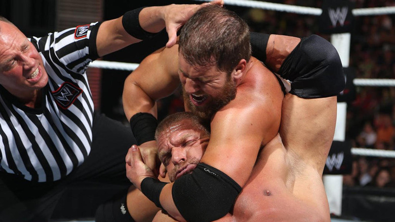 Triple H wrestles Curtis Axel