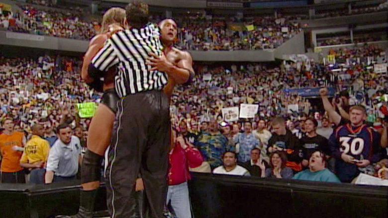 Triple H wrestles The Rock