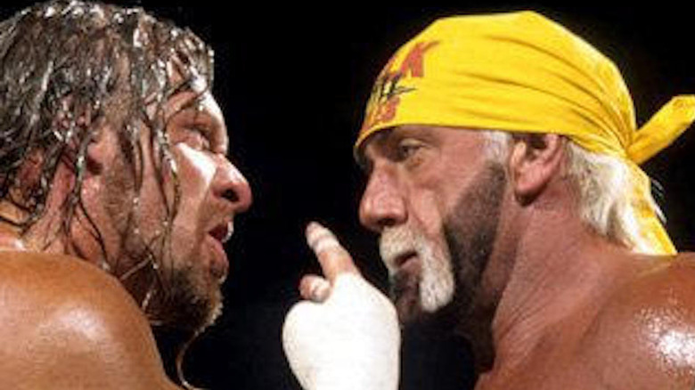 Triple H stares at Hulk Hogan