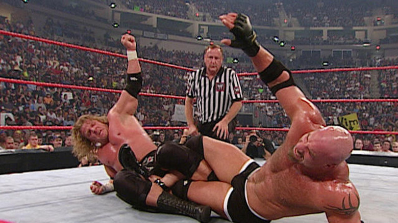Triple H wrestles Goldberg