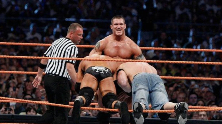 HHH wrestles Orton and Cena