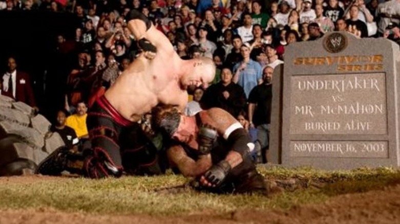 Kane attacking Undertaker