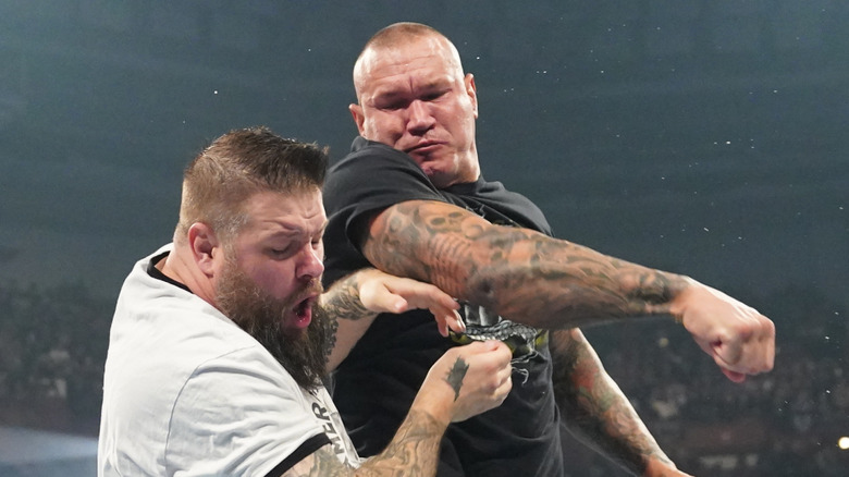 Randy Orton punches Kevin Owens during Smackdown at Bon Secours Wellness Arena on October 11, 2024 in Greenville, South Carolina.