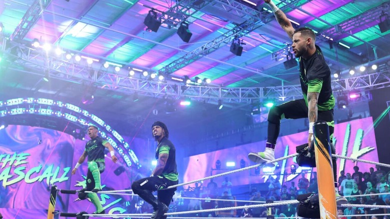 The Rascalz pose on the ring ropes and turnbuckles before a match on 