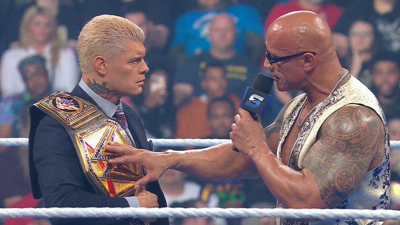 The Rock confronts Cody Rhodes during 