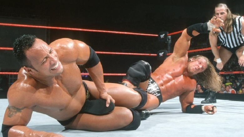 The Rock wrestling Triple H