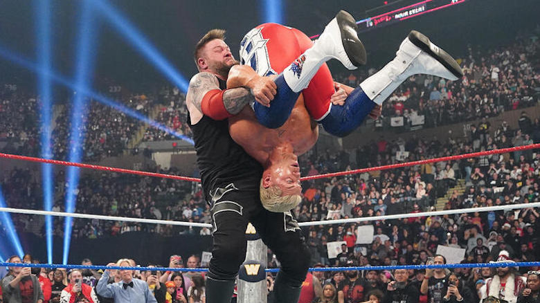 Kevin Owens hits a package piledriver on Cody Rhodes