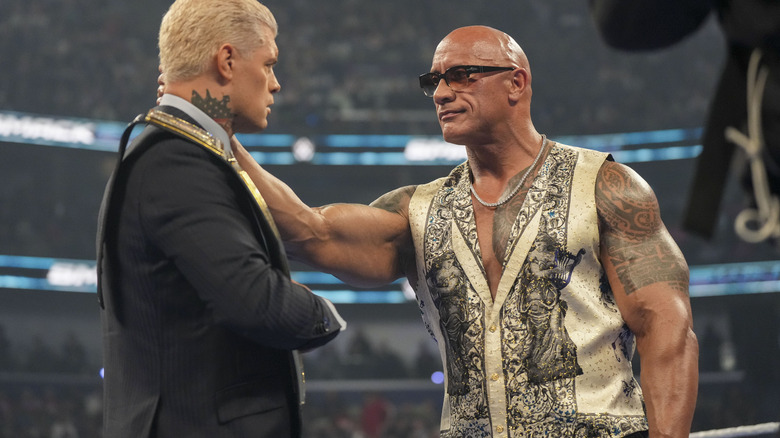 The Rock lays his hand on the shoulder of Cody Rhodes on "WWE SmackDown."