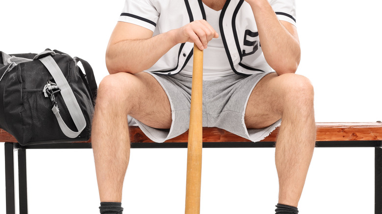 baseball player alone on bench