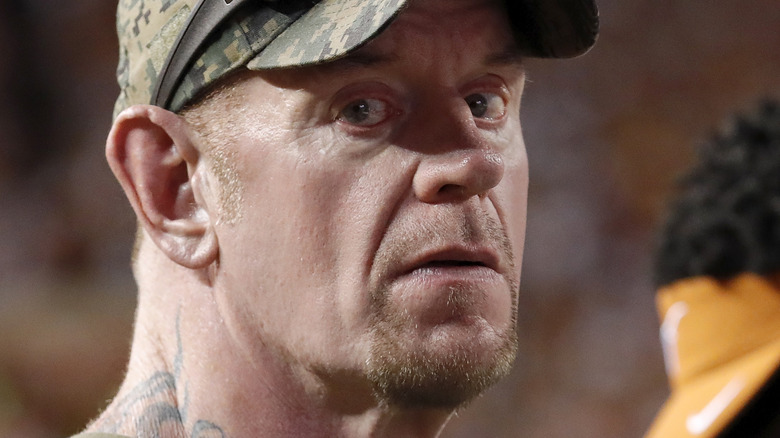 The Undertaker in baseball cap