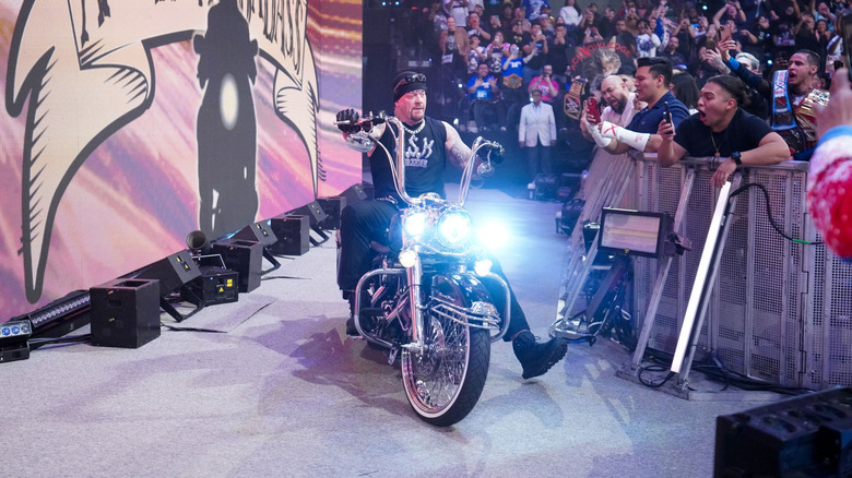 The Undertaker riding his motorcycle at the WWE Raw debut on Netflix