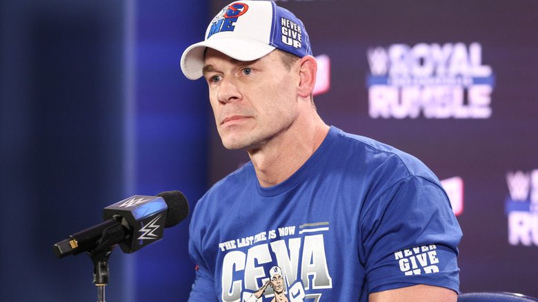 John Cena talking into a microphone