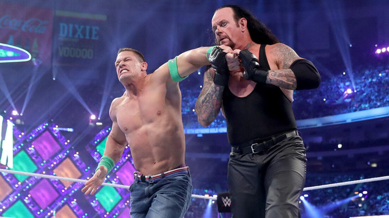 John Cena and The Undertaker in the ring