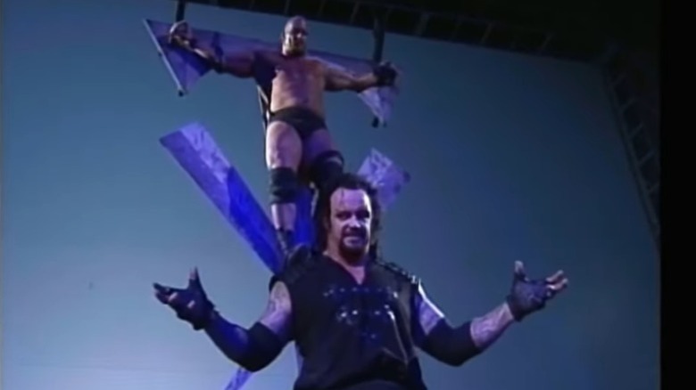 undertaker with crucified steve austin