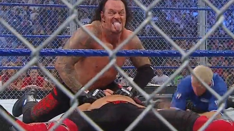 undertaker in ring with edge