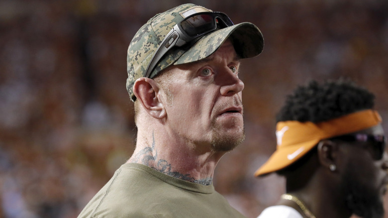 Mark Calaway AKA The Undertaker in a camo hat