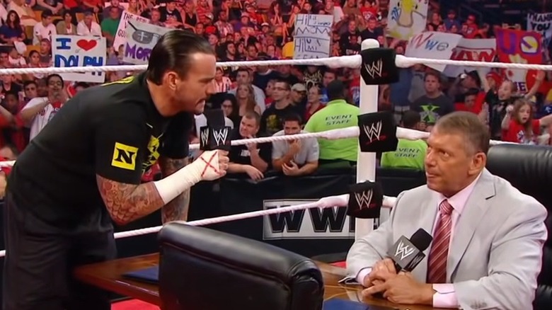 CM Punk speaking to Vince McMahon