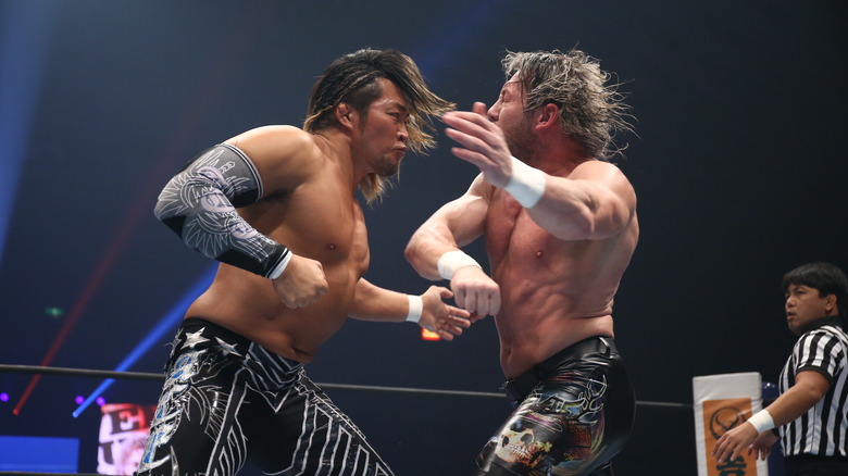 Kenny Omega battling Hiroshi Tanahashi