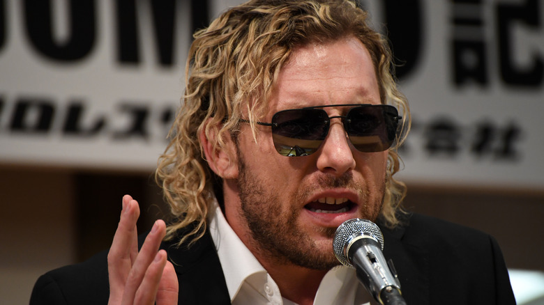 Kenny Omega speaking during a press conference