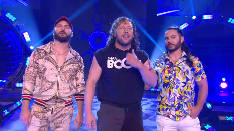 Kenny Omega and the Young Bucks on the stage