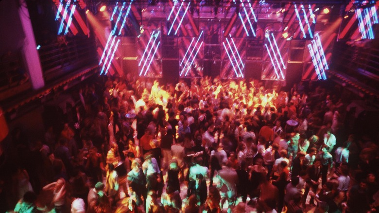 People on the dance floor of Studio 54