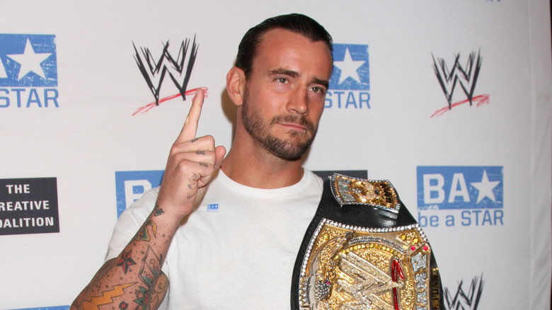 CM Punk as WWE Champion and creator of The Shield