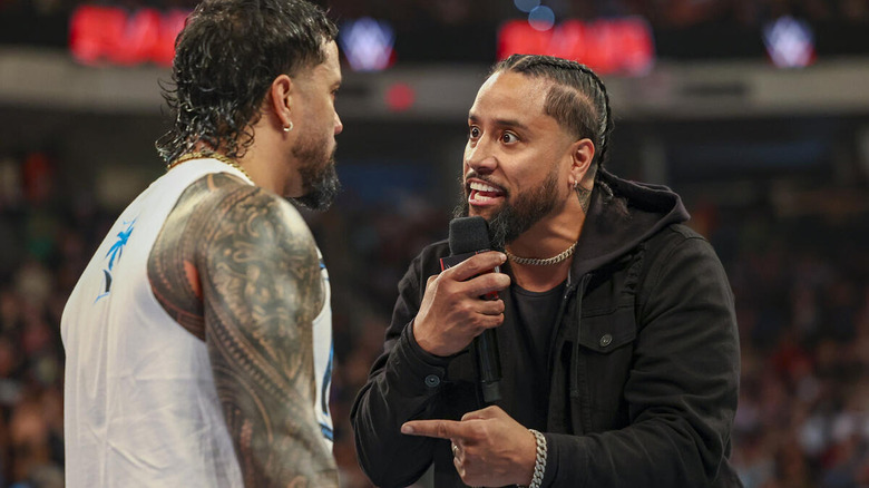 Jimmy Uso talking to Jey