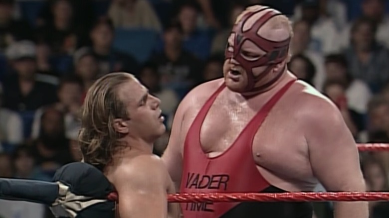 Vader putting Shawn Michaels in the corner