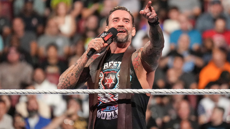 CM Punk pointing microphone