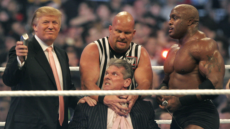 Mr. McMahon getting his head shaved by Donald Trump, Stone Cold Steve Austin and Bobby Lashley