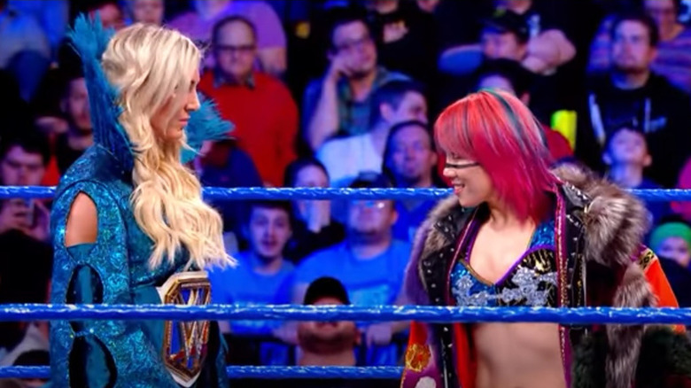 Charlotte Flair and Asuka staring each other down