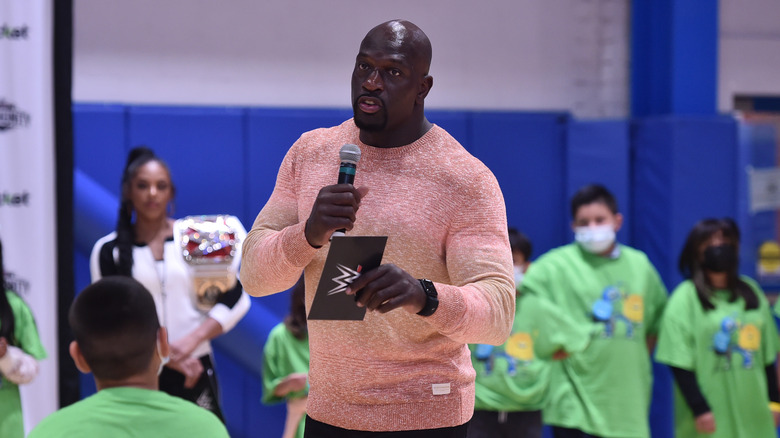 Titus O'Neill mentors some children