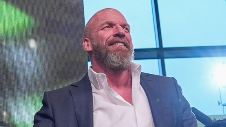 Triple H grins a grin