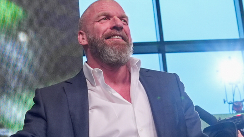 Triple H grins a grin