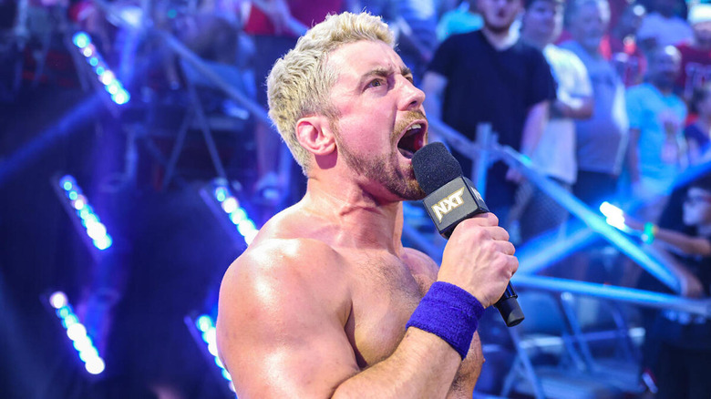 Joe Hendry shouting into a microphone