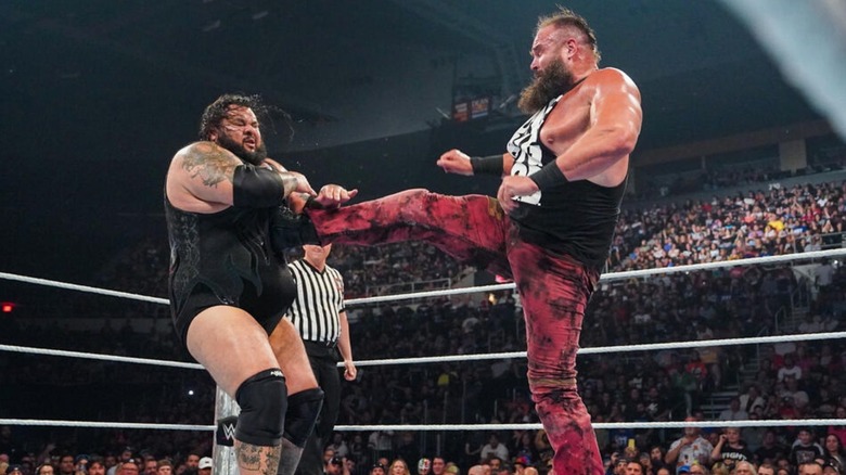 Braun Strowman hits Bronson Reed with a big boot in the middle of the ring during a match on "WWE Raw."