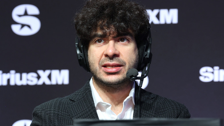 Tony Khan wearing a headset