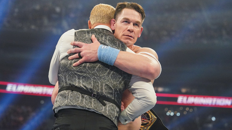 John Cena hugging Cody Rhodes just before attacking him