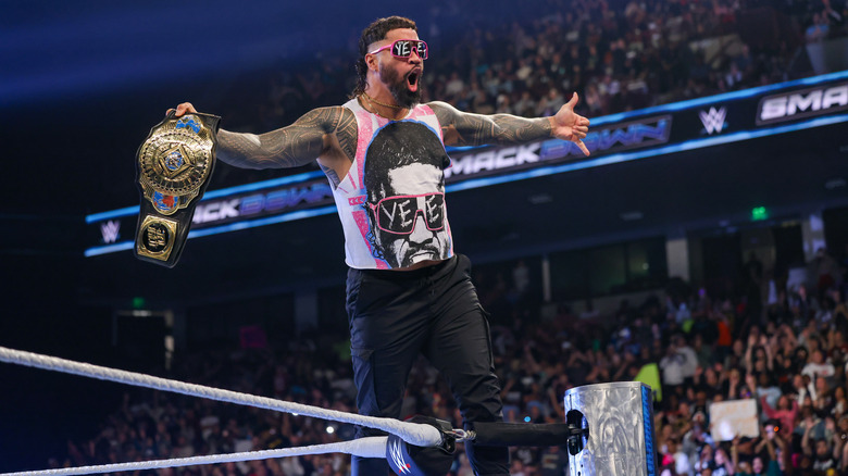 Jey posing with the Intercontinental Championship