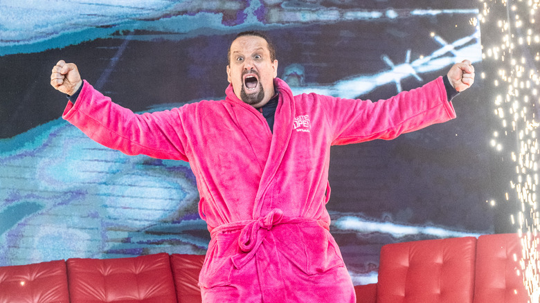 Tommy Dreamer poses in a robe