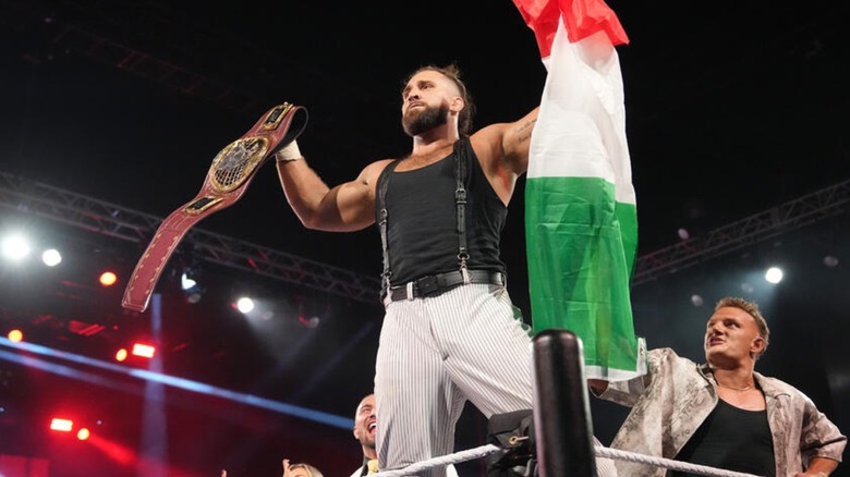 Reigning NXT North American Champion Tony D'Angelo celebrates with the title