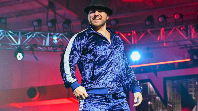 Tony D'Angelo wearing a blue track suit