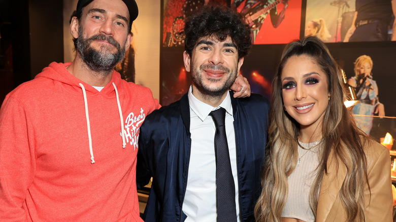 Tony Khan with CM Punk and Britt Baker